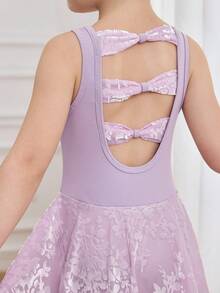 1 chiếc đầm múa ba lê màu hồng tím ngọt ngào dễ thương cho bé gái, thiết kế nơ khoét lưng, chất liệu vải mềm mại, co giãn tốt, phù hợp cho các buổi biểu diễn ở trường, múa ba lê, các cuộc thi khiêu vũ, tiệc sinh nhật. - Màu tím - Xem 4