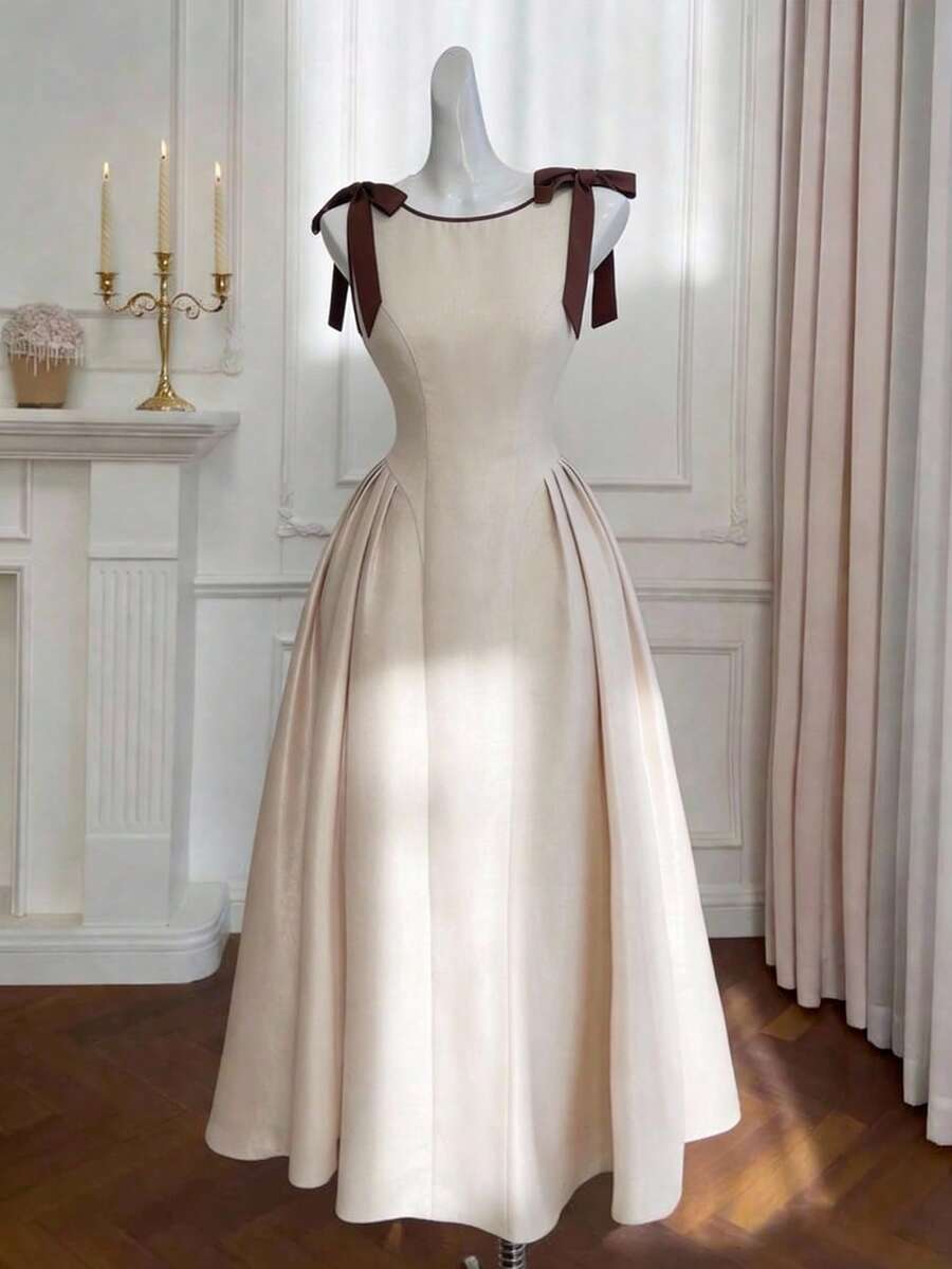 SHEIN MOD Plus Size Retro Crew Neck Sleeveless Contrast Trim Bow Decor Waist Flare Hem Khaki Casual Dress,A-Line Maxi Women Outfit,Homecoming Dresses,Fall Women Dresses, - Apricot - View 1