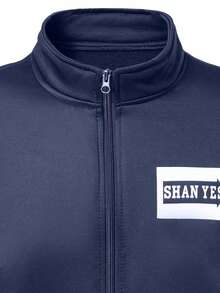 Conjunto de camiseta de manga larga con cuello alto y pantalones de chándal de colores lisos para hombre, ideal para otoño/invierno. Con letras estampadas en los puños y el dobladillo acanalados. Tejido suave y cómodo. Mangas largas con cremallera y cintura con cordón. Corte entallado pero holgado, ideal para actividades al aire libre. Conjunto de dos piezas. - Negro - Ver 4