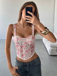 Aloruh 这位女士身穿优雅的红色蕾丝文胸，搭配罩杯式上衣和紧身连衣裙，胸部采用褶皱设计，肩带系成蝴蝶结，适合音乐会、乡村音乐会、夜总会和性感派对等场合。性感优雅的派对上衣。花朵上衣、夏季上衣、束身胸衣、玫瑰上衣、Y2K风格女士束身胸衣、女士束身胸衣、花朵束身胸衣、夏季束身胸衣、可爱束身胸衣、刺绣束身胸衣、束身衣套装 - 彩色 - 查看 8