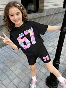 两件套少女休闲数字蝴蝶结装饰短袖T恤和短裤套装，适合音乐节、校园、街头、户外野餐、郊游、街头摄影、居家穿着。 - 黑色 - 查看 1