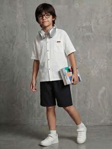 Casuvi Kids Bộ đồ hè mới thời trang cho bé trai: áo sơ mi ngắn tay và quần short rộng rãi. - Đen và trắng - Xem 1