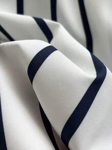 GlowEve Women's Striped Fabric Collared Short Sleeve Loose Top Shirt Paired With Asymmetric Pleated Mini Skirt 2 Pieces Set - Blue and White - View 5