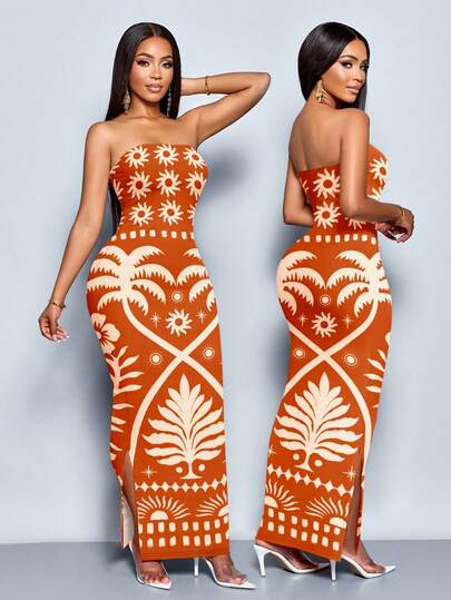 SOLERSUN Este vestido estampado con bloques de color es un imprescindible del verano. Adornado con motivos de palmeras, vestidos de novia y soles, presenta un diseño ajustado y sin tirantes, convirtiéndolo en la elección perfecta para unas vacaciones.