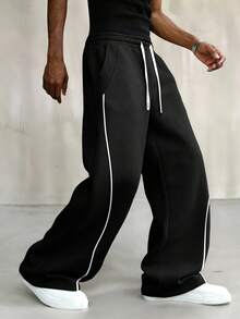 Manfinity EMRG Quần jogger nam in chữ "God's Son", dáng rộng thoải mái, unisex, phong cách đường phố, dễ chịu, phù hợp mọi mùa. - màu đen - Xem 4