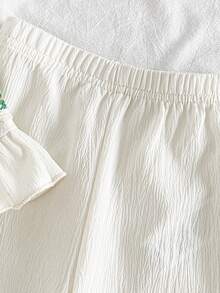 SHEIN Vintaside Kids 两件套女婴套装，包括一件钩针花卉图案背心和一条舒适长裤，优雅的韩欧风格，百搭实用，是新款夏季时尚童装，适合婴幼儿、女童，也适合外出、节日、派对、度假等场合。 - 杏色 - 查看 8