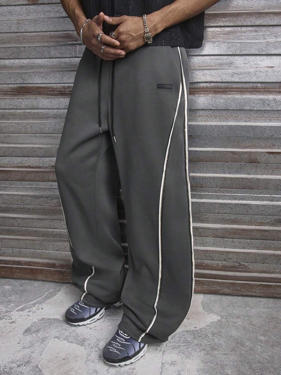AXEPEAK Men's Casual Sports Contrast Trim Loose Drawstring Waist Sweatpants - Black - View 1