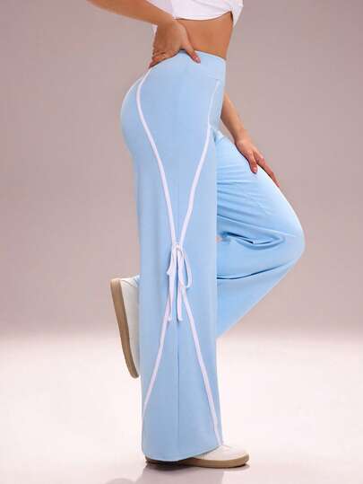 Sovereign Charm Leggings deportivos de pierna ancha con decoración de mariposa y bolsillo para teléfono, color azul claro, adecuados para entrenamiento y actividades al aire libre