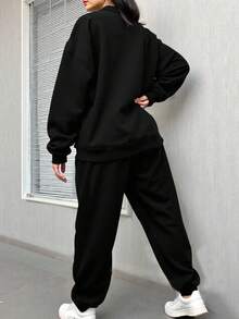 Rovax 2 pezzi Set di felpa girocollo e pantaloni della tuta casual da donna con stampa di lettere e cuori, autunnale - nero - Visualizzare 2