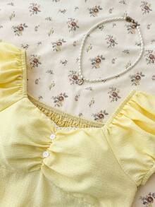 Áo kiểu cho bé gái tuổi teen, kiểu dáng đơn giản, thoải mái, kẻ caro với xếp ly phía sau. - Màu vàng - Xem 6