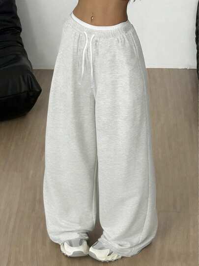 SHEIN Pantalones de chándal holgados y cómodos de cintura media con cordón decorativo y estampado de color contrastante para niñas preadolescentes