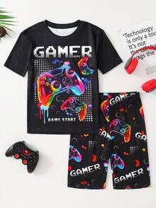 SHEIN Conjunto de pijama de 2 piezas ajustado para niño preadolescente - Parte superior de manga corta con cuello redondo y pantalones cortos con estampado de control de juego neón, suave y amigable con la piel - Negro - Ver 6