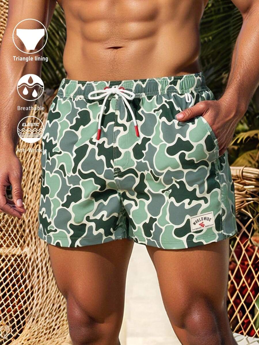 Manfinity VDAYZ Pantalones cortos de playa casuales con cintura elástica y bolsillos, de camuflaje para hombres - Verde Oliva - Ver 1