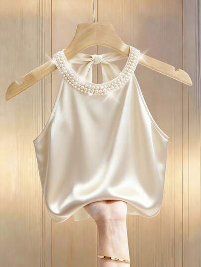 Franclia Women's Champagne-Colored Satin Elegant Backless Tie-Neck Round Neck Pearl Halter Top, Pearl Top, Sparkly Top, Summer Top, Summer Holiday Outfit, Women's Summer Outfit, Women's Spring Outfit, Women's Valentine's Day Outfit, Carnival Women's Look, Party Top, Women's Beach Outfit, Women's Elegant Shirt, Women's Casual Top, Sequined Top, Camisole, Satin Fabric, Suitable For Commuting, Everyday Elegance.Fashionable Casual Commuter Wear, Business Office Wear, Versatile And Stylish Everyday Casual Wear, Urban Teacher's Professional Attire