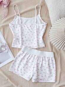 Bộ đồ cho bé gái tuổi teen gồm áo hai dây trắng viền ren thắt nơ và quần short siêu ngắn cài nút, thích hợp cho mùa xuân và hè, phù hợp cho ngày Valentine, mặc ở nhà, phong cách giản dị, tuổi teen. - Hồng - Xem 2
