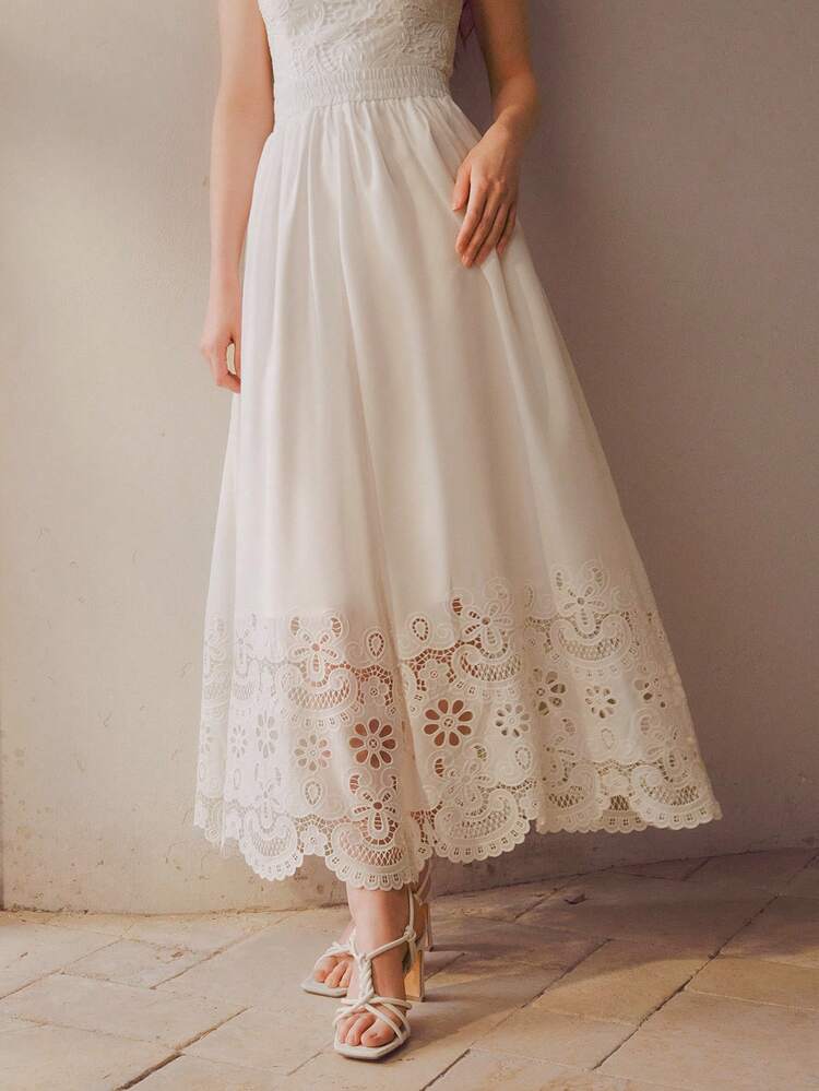 SPRING/SUMMER NEW WHITE HOLLOW EMBROIDERED ASYMMETRICAL HEM ELASTIC WAIST WOMEN'S A-LINE SKIRT, ELEGANT PASTORAL STYLE
