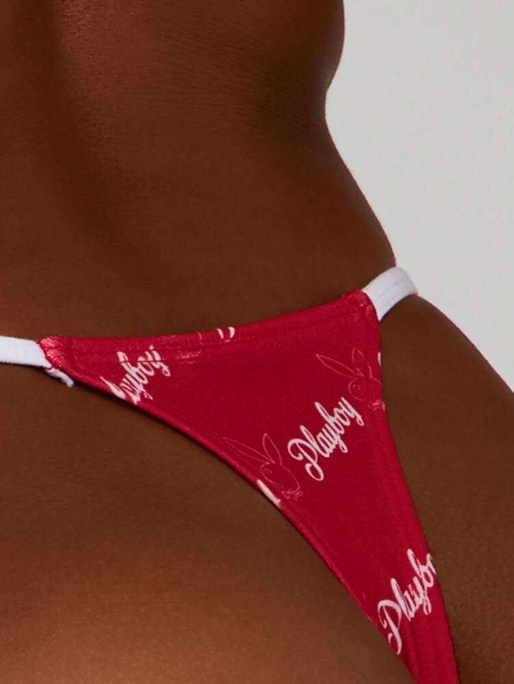 Missguided x Playboy Majtki typu stringi z kontrastowymi paskami i nadrukiem na całej powierzchni