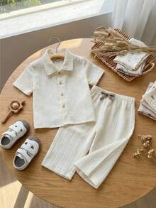 SHEIN 2pcs Baby Boy Vintage Textured Ribbed Polo Collar Shirt And Simple Long Pants Set, Suitable For Home And Outings - White - View 1