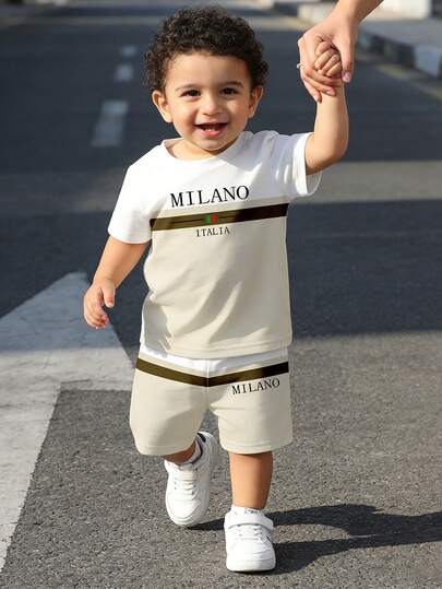 Souflis Souflis Conjunto de camiseta de cuello redondo con bloqueo de color y estampado de letras, y pantalones cortos a juego, para niños pequeños, adecuado para verano, ropa de estar en casa, actividades al aire libre, deportes, uso escolar