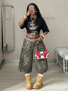 Coolane 女士宽松休闲极简街头风黑色唇印圆领短袖T恤，适合春夏穿着。 - 黑色 - 查看 6