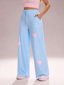 Sovereign Charm Quần legging thể thao nữ dáng rộng, in hình trái tim, màu xanh nhạt, có túi đựng điện thoại, thích hợp cho tập luyện và các hoạt động ngoài trời. - Màu xanh nhạt - Xem 4