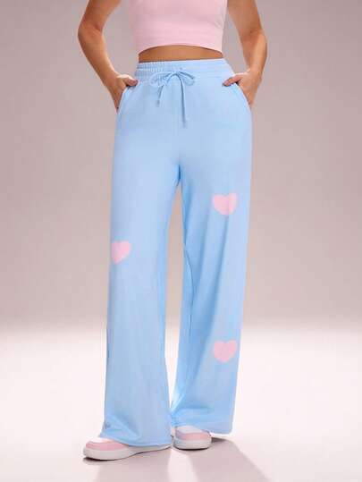 Sovereign Charm 女士宽松版心形印花浅蓝色运动紧身裤，带手机口袋，适合锻炼和户外活动