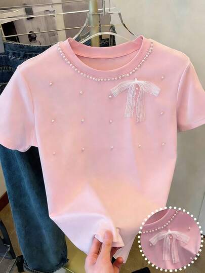 Resyla Women's Solid Color Valentine's Day Pink Lace Bow And Pearl Decor Sweet Y2K Style Short Sleeve T-Shirt, Suitable Soft Fabric,Summer Tops,Spring Outfit Women,Pink Top,Beach Outfit,Party Top,Weddings And Events Top,Birthday Outfits For Women,Going Out Tops,Elegant Women's Blouses,Vacation Outfits Women,Casual Blouses For Women,Suitable For Dates, Daily Wear, Commuting, Versatile, Fashionable, Casual Pink Bow Top Baby Pink Tops Pink T Shirt Girly Tops Pink Y2k Top