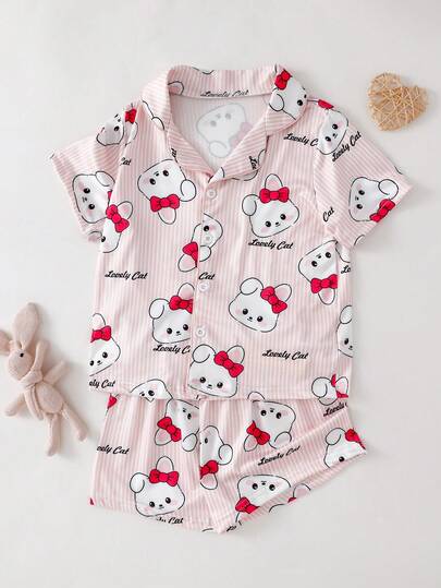 Bộ đồ ngủ 2 món cho bé gái, gồm áo tay ngắn và quần short in hình thỏ tai cụp hoạt hình dễ thương, thoải mái, in hình thỏ xanh.