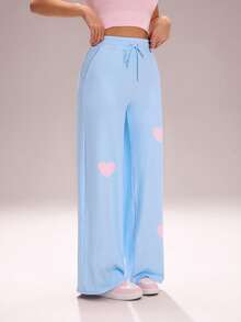 Sovereign Charm Quần legging thể thao nữ dáng rộng, in hình trái tim, màu xanh nhạt, có túi đựng điện thoại, thích hợp cho tập luyện và các hoạt động ngoài trời. - Màu xanh nhạt - Xem 3