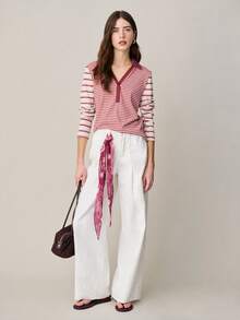 Nöista 修身条纹长袖Polo衫，纽扣门襟，休闲版型。百搭款式，适合节日装扮、春季穿搭和日常休闲穿着。 - 粉色 - 查看 3