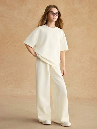 SHEIN Oversized Tee & Pants Set For Tween GirlsLoose Batwing Sleeve T-Shirt + Wide Leg Pants, Air Layer Fabric, Comfortable, Suitable For Vacation & Leisure Wear, Cream White