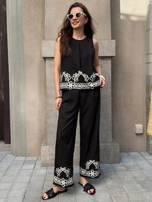 Solivie Bộ đồ nữ thanh lịch gồm áo kiểu xếp ly màu trơn có họa tiết và quần ống rộng họa tiết hoa. - màu đen - Xem 6