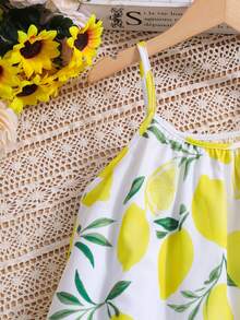 Sparklyn Đầm yếm mùa hè in hình chanh cho bé gái, đầm chữ A viền lá sen tươi mát, chất liệu nhẹ và thoáng khí in họa tiết chanh, thân thiện với da và thấm hút mồ hôi, thích hợp cho mặc hàng ngày vào mùa hè, đi nghỉ mát và các dịp khác. - Nhiều màu - Xem 6