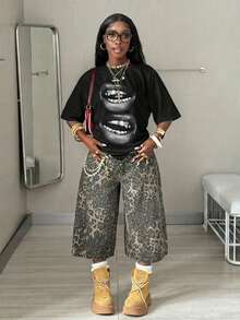 Coolane 女士宽松休闲极简街头风黑色唇印圆领短袖T恤，适合春夏穿着。 - 黑色 - 查看 8