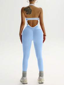 Easithlete Bộ jumpsuit ôm sát, cổ yếm, hở lưng, khoét eo, viền tương phản. - Màu xanh lam - Xem 4