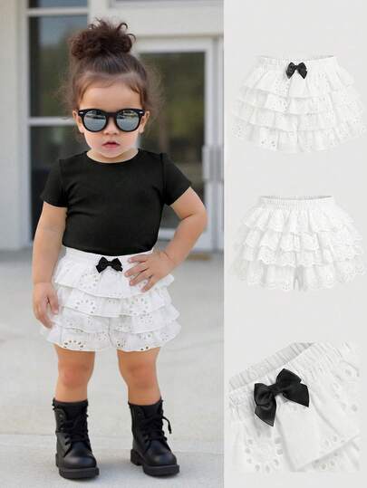 SHEIN Pantalones cortos casuales de bebé niña con volantes en el bajo, de unicolor tejido