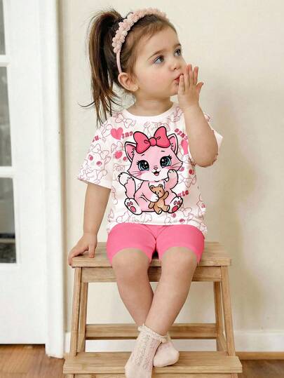 SHEIN Baby Girl Cute Cartoon Cat Animal Print Loose Round Neck Short Sleeve T-Shirt And Tight Bike Shorts Set, Suitable For Spring/Summer Everyday Wear
