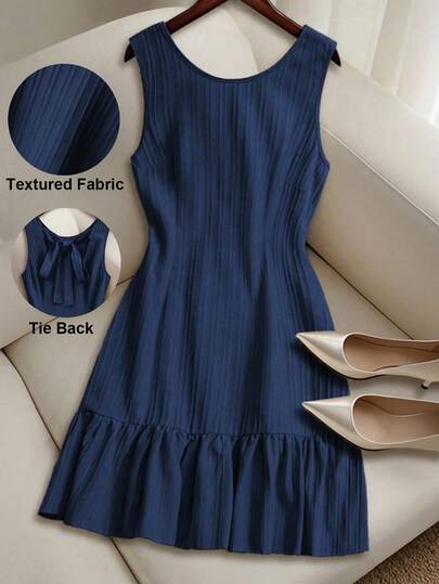 GlowEve CURVE Women's Woven Backless Tie Neck Sleeveless A-Line Ruffle Hem Casual Mini Dress, Suitable For Leisure, Vacation And Daily Wear Navy Blue Dress Ruffle Hem Dress Elegant Dress Dark Blue Dress Sleeveless Dress Navy Blue Elegant Dress Drop Waist Dress Peplum Dress