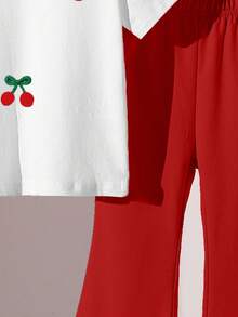 Bộ 2 món cho bé gái, gồm áo thun trắng tay ngắn cổ tròn in hình quả anh đào và quần ống loe đỏ, họa tiết hoạt hình dễ thương, thời trang, phù hợp cho mùa xuân/hè, thoải mái và đa năng. - Nhiều màu - Xem 4