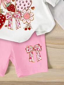 SHEIN Playful Pals 女婴两件套休闲套装，简约甜美草莓蝴蝶结印花圆领短袖T恤搭配粉色短裤，适合春夏、户外活动和上学穿着。 - 彩色 - 查看 4