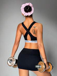 Slayform حمالة صدر رياضية للنساء بلون أحادي وياقة مستديرة وظهر متقاطع بشكل سلس للاستخدام اليومي - الأسود - مشاهدة 5