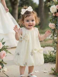 Souflis Souflis 1件女婴圆领无袖花卉刺绣蝴蝶结装饰A字休闲连衣裙，杏色，适合夏季郊游、旅行、摄影和其他场合 - 杏色 - 查看 3