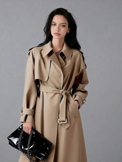 Abrigo largo en silueta ceñido en la cintura británico midi