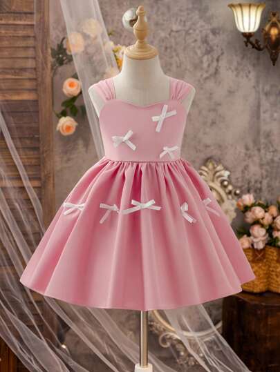 女童背带裙，无袖梭织面料泡泡裙，带蝴蝶结装饰，适合日常穿着、派对、假日穿着。