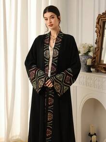 Al Najma Women's Modest Elegant Embroidered Flare Sleeve Loose Arabic Abaya Robe - Black - View 3