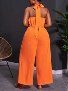 Veslaya Bộ jumpsuit nữ cỡ lớn mùa Xuân & Hè 2026, thích hợp cho các dịp lễ hội âm nhạc, lễ Phục Sinh, phong cách miền Tây, du mục, tiệc sinh nhật, lễ tốt nghiệp, đại học, sinh viên, thường ngày, dễ phối đồ, kỳ nghỉ, du thuyền, bãi biển, tắm nắng, xu hướng thời trang đường phố, khách dự đám cưới, đi làm, ăn sáng muộn, sân bay, tiệc tùng, dã ngoại, dạ hội sang trọng, vũ hội, thường ngày. Jumpsuit ống rộng ôm sát màu cam cao cấp, dây buộc cổ chéo, kiểu dáng Kingsday, jumpsuit nữ màu cam, jumpsuit cổ yếm. - trái cam - Xem 4