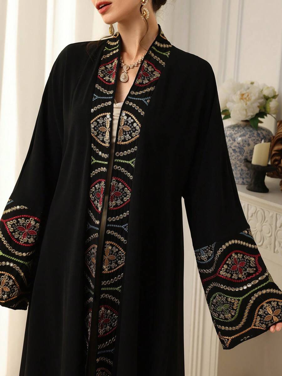 Al Najma Women's Modest Elegant Embroidered Flare Sleeve Loose Arabic Abaya Robe - Black - View 1