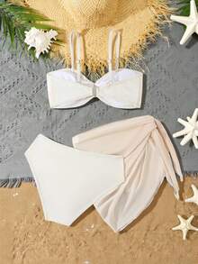 SHEIN 少女比基尼套装，时尚杏色纯色，网纱针织面料，无肩带上衣配肩带，网纱裙。三件套：金属肩带无肩带上衣+三角裤+网纱裙。时尚、休闲、优雅、淑女风。适合游泳、夏季度假、夏季海滩、海边泳池、游泳池、夏季派对、休闲度假等场合。贝壳图案泳衣，保守比基尼套装，两件式泳装，少女泳衣套装，青少年两件套泳装。 - 彩色 - 查看 2