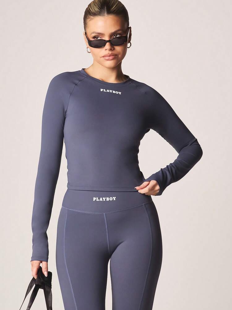 Missguided x Playboy Long Sleeve Crew Neck Fitted Activewear Top With Logo Print And Raglan Sleeves For Casual Exercise And Leisure Wear