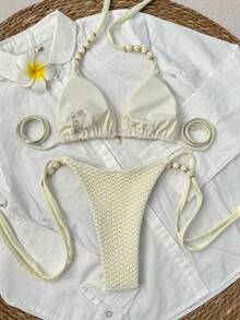 Swim Vcay Set de 2 piezas Bikini de unicolor con triángulo halter, decoración de perlas y pantalones con nudo mariposa lateral, traje de baño para mujer - Beis - Ver 2